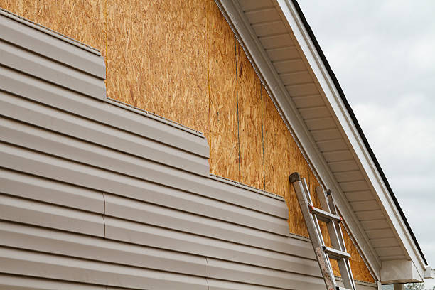 Professional Siding Contractor technician working in Frederick, MD